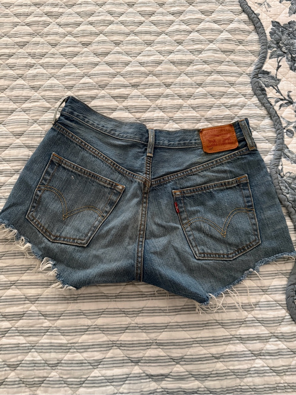 Levi's Medium Blue Denim Cutoff Shorts with Frayed Hem
